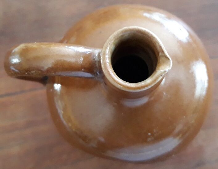 Small pitcher sandstone - 60s/70s - " Federal law forbids dirty. Or reuse of this bottles "