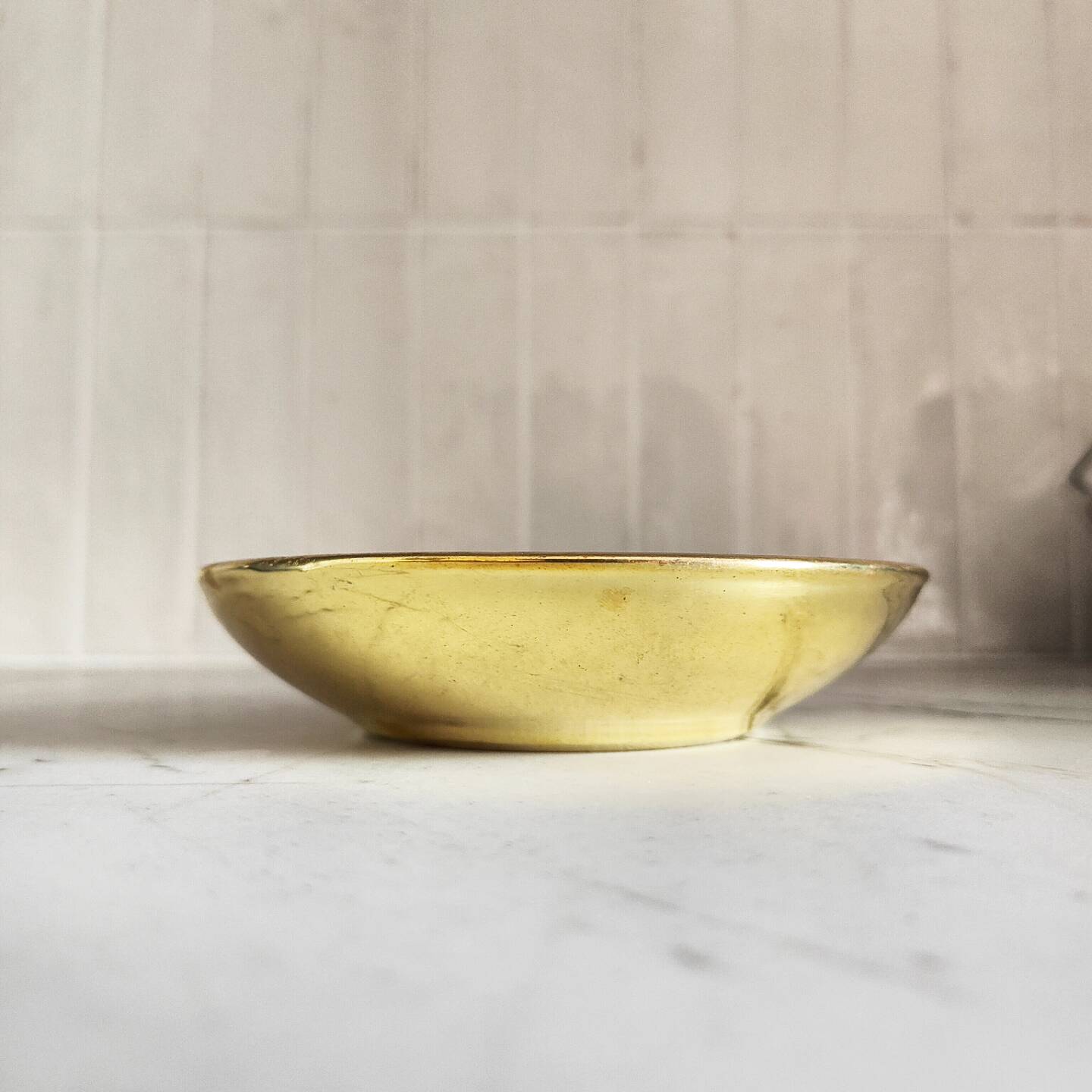 Porcelain and brass bowl