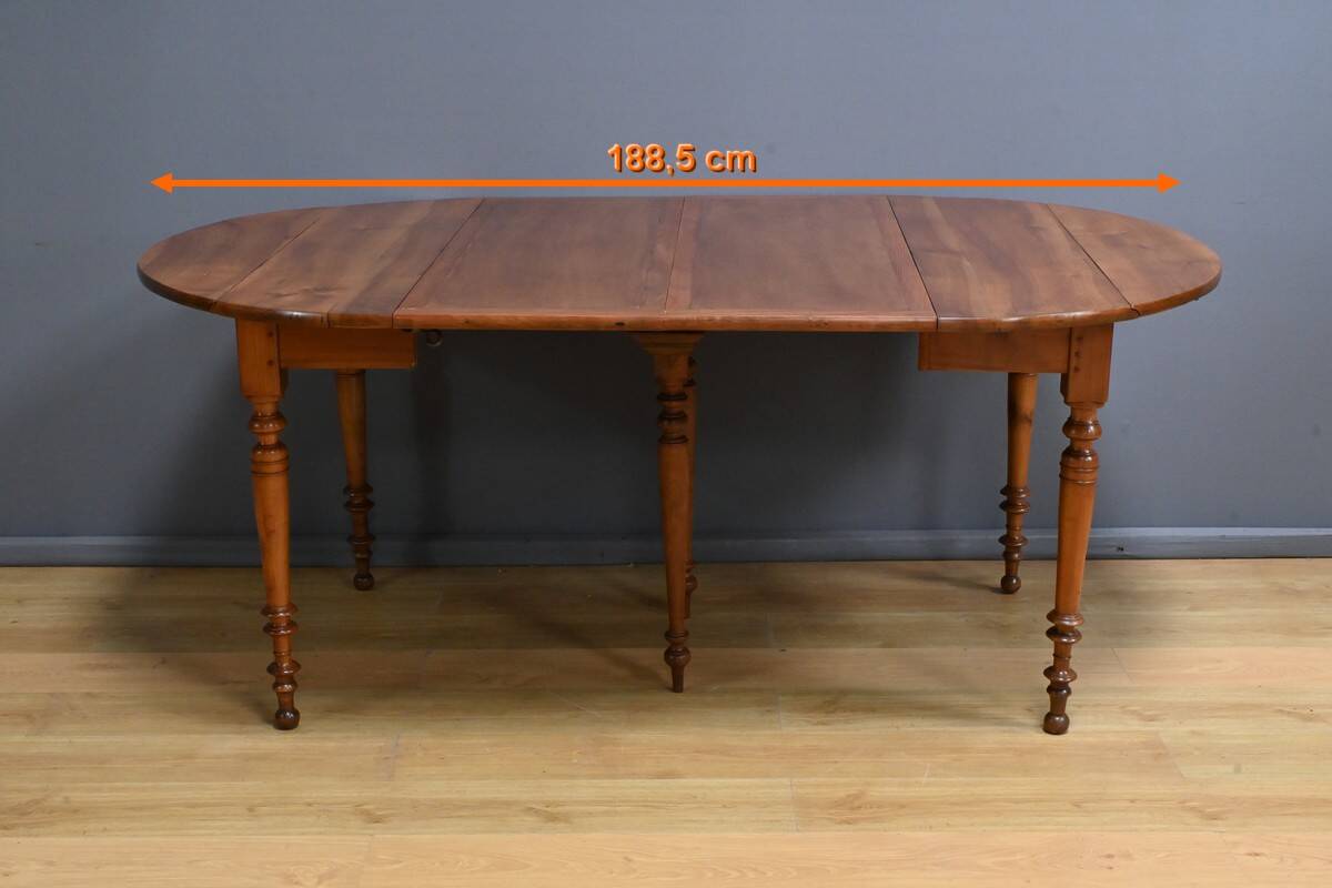 Table for 4 to 10 people with cherry wood extensions, Louis Philippe style – Late 11th century