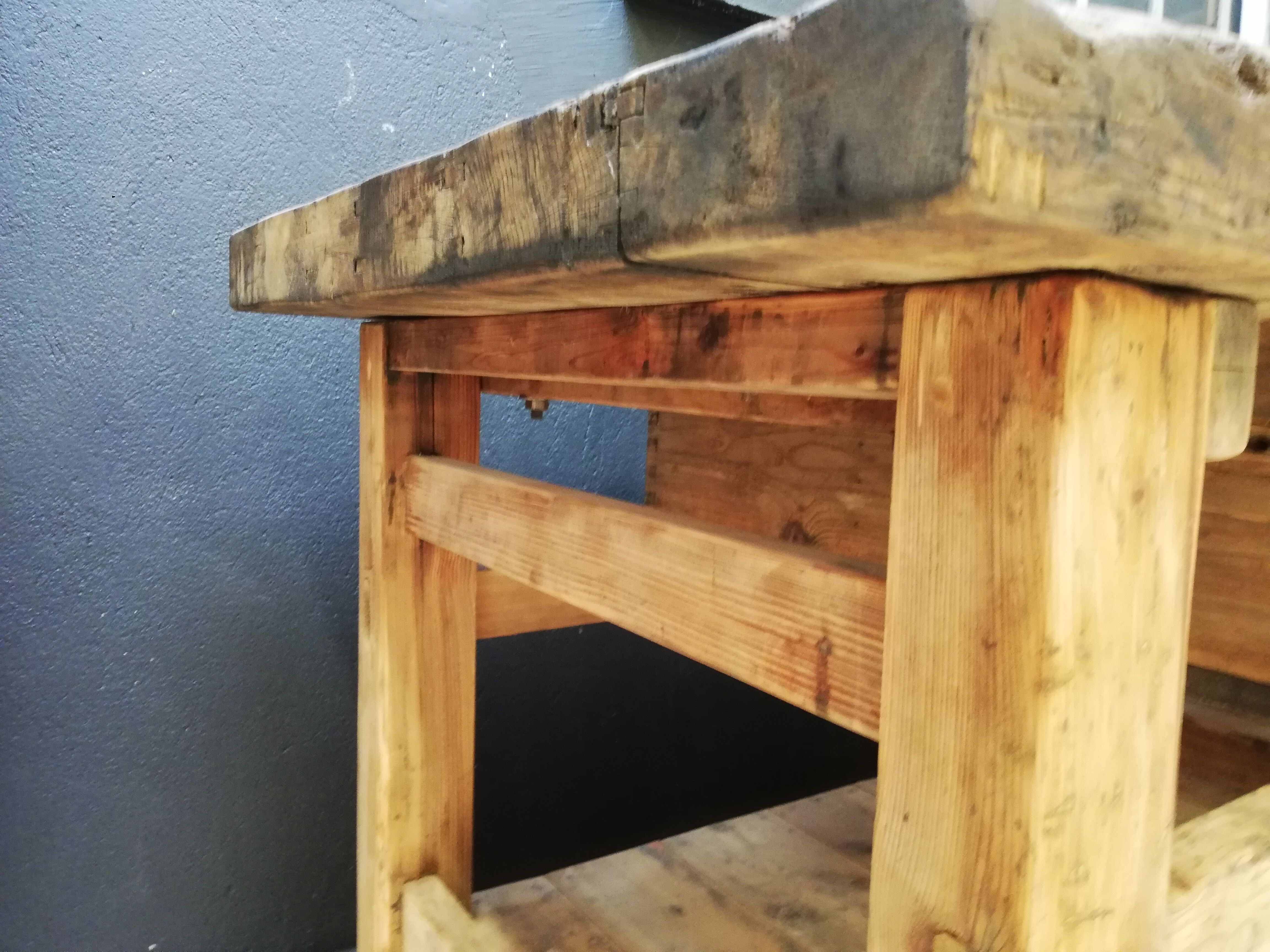 Old vintage wooden carpenter's workbench, industrial decoration