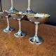 Silver-plated metal wine glasses on stems from the 1970s.