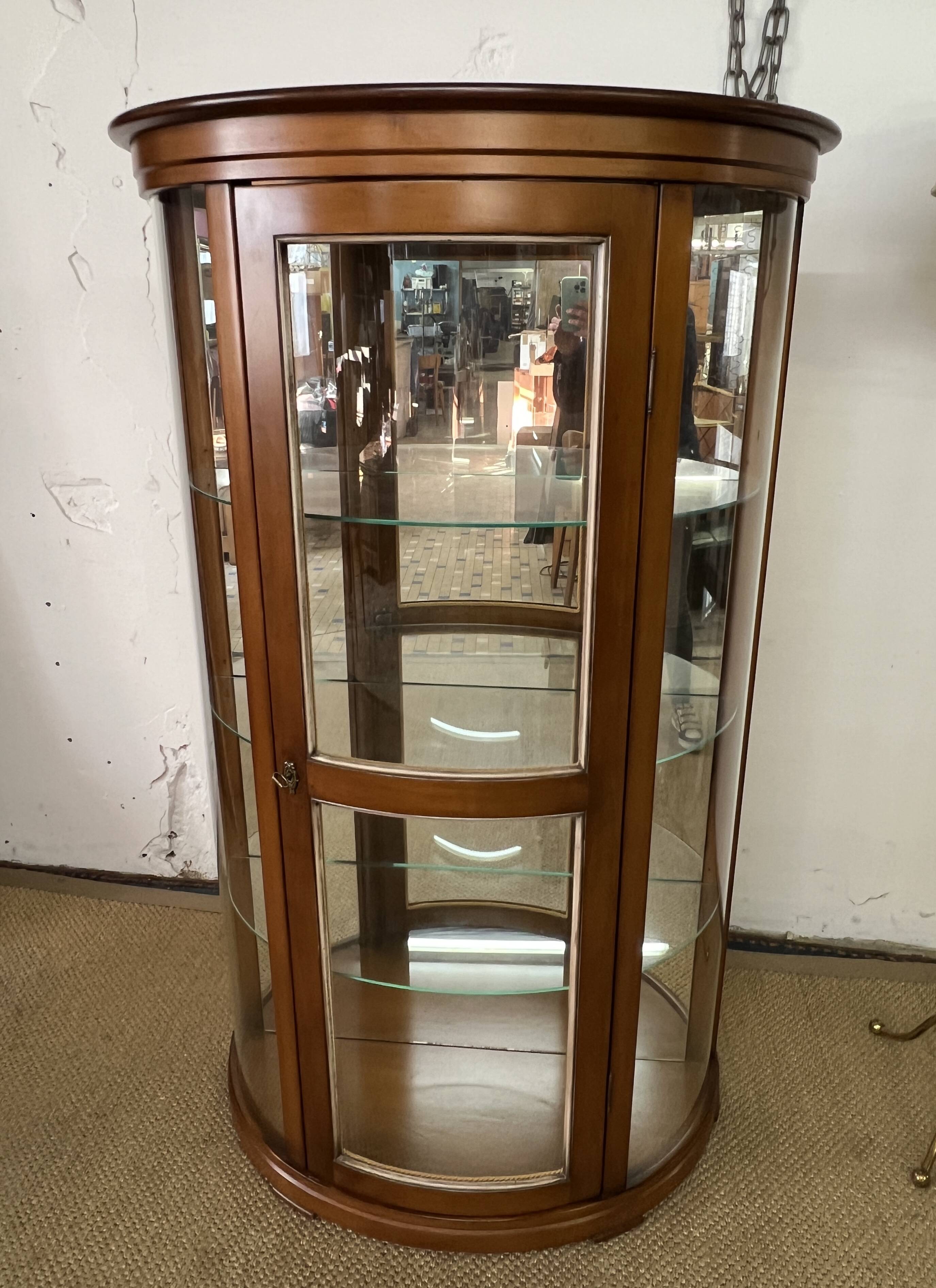 Wooden display case and half-moon mirror