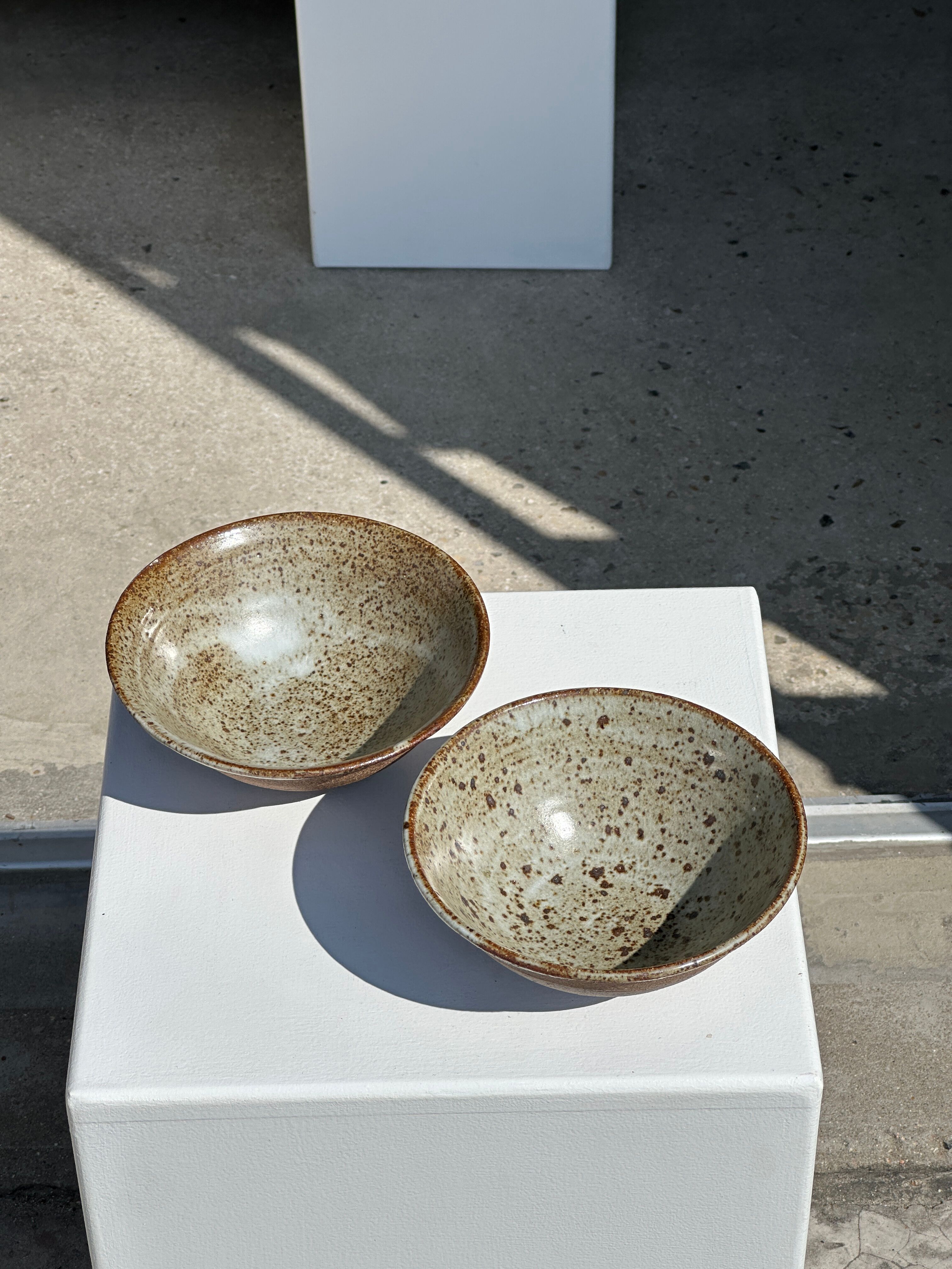 Duo of ceramic bowls interior glazed exterior matt raw earth
