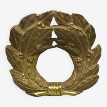 Old ornament in embossed brass - laurel wreath