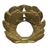 Old ornament in embossed brass - laurel wreath