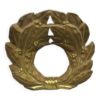 Old ornament in embossed brass - laurel wreath