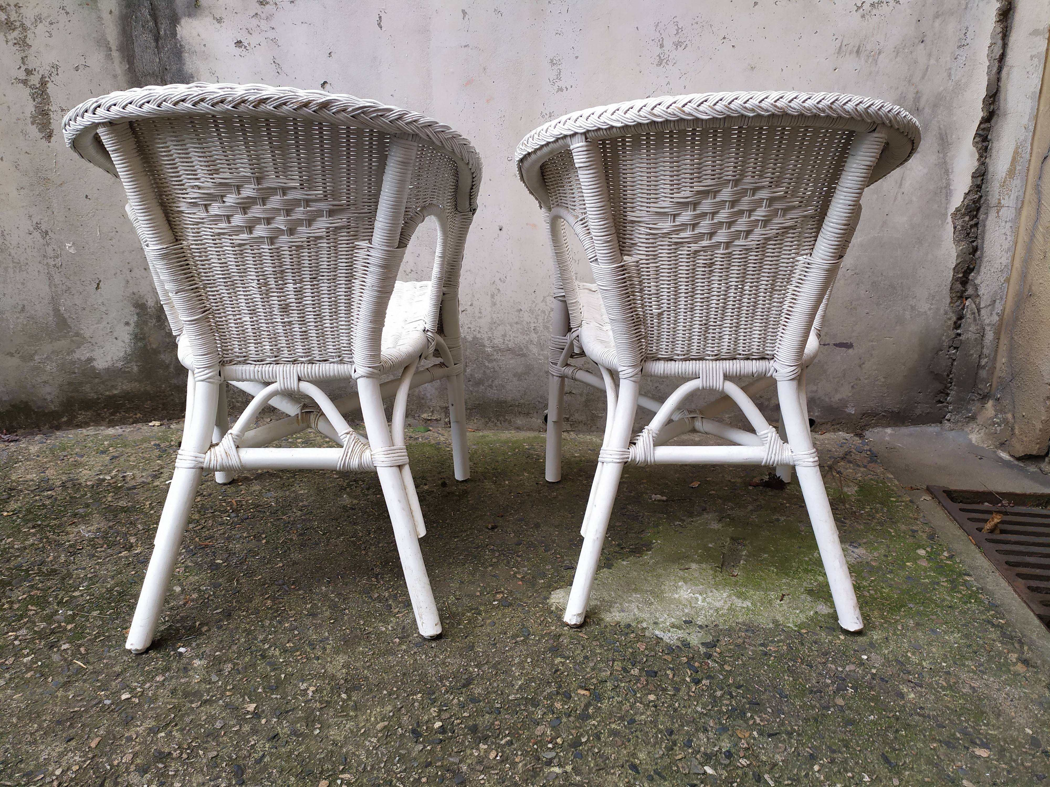 Pair of vintage rattan chairs