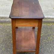 Vintage farmhouse dessert trolley on wheels made of solid wood from the 19th century.