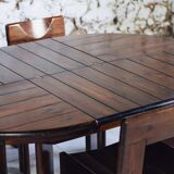 Extendable table and 5 chairs by Silvio Coppola, 1970.