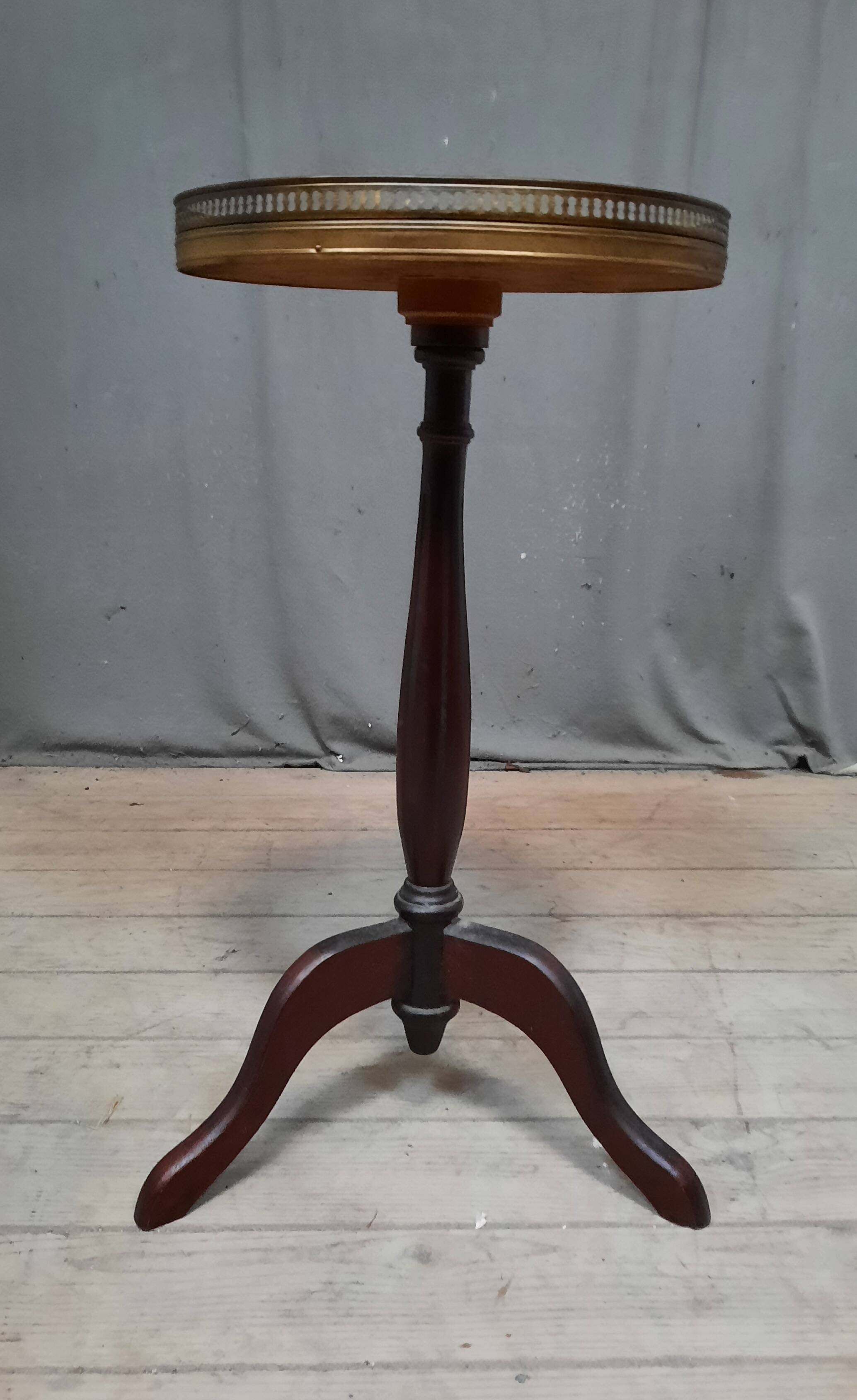 Small marble top pedestal table