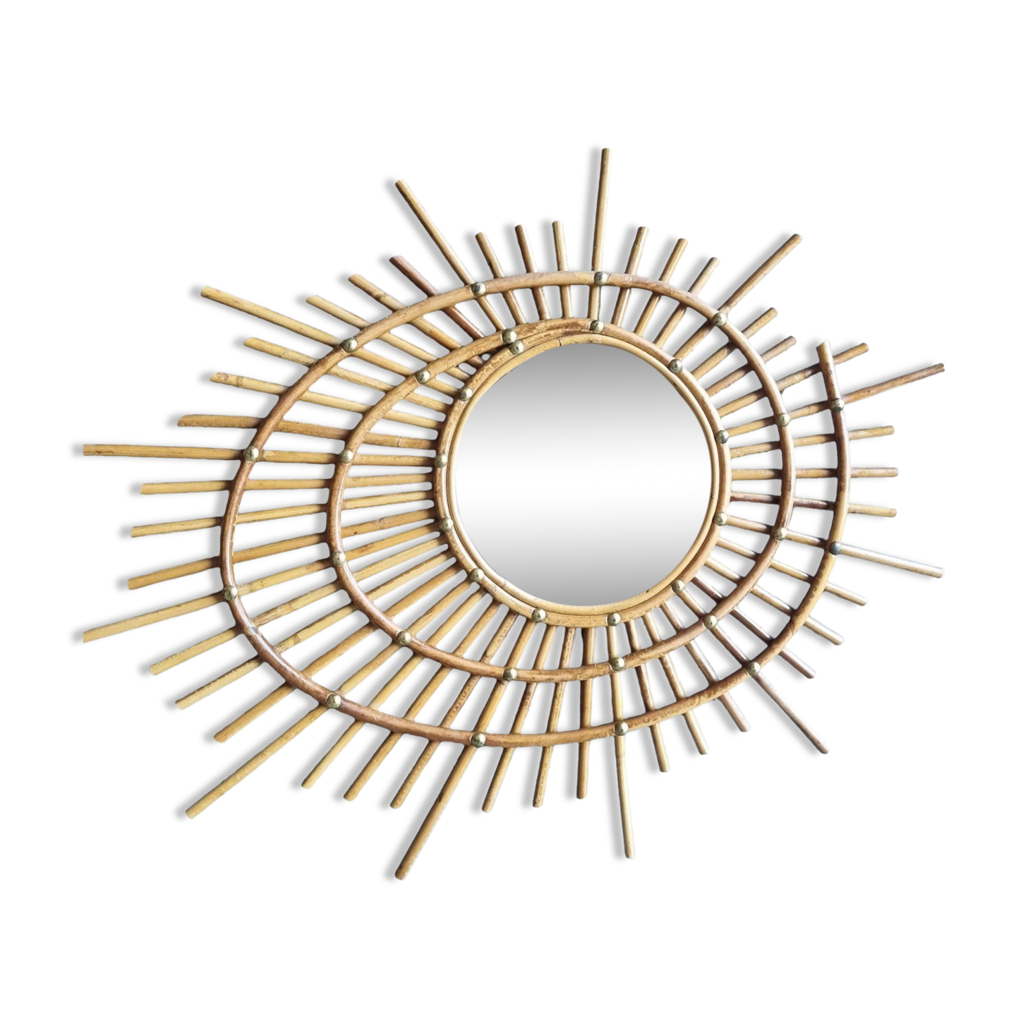 Asymmetrical rattan mirror