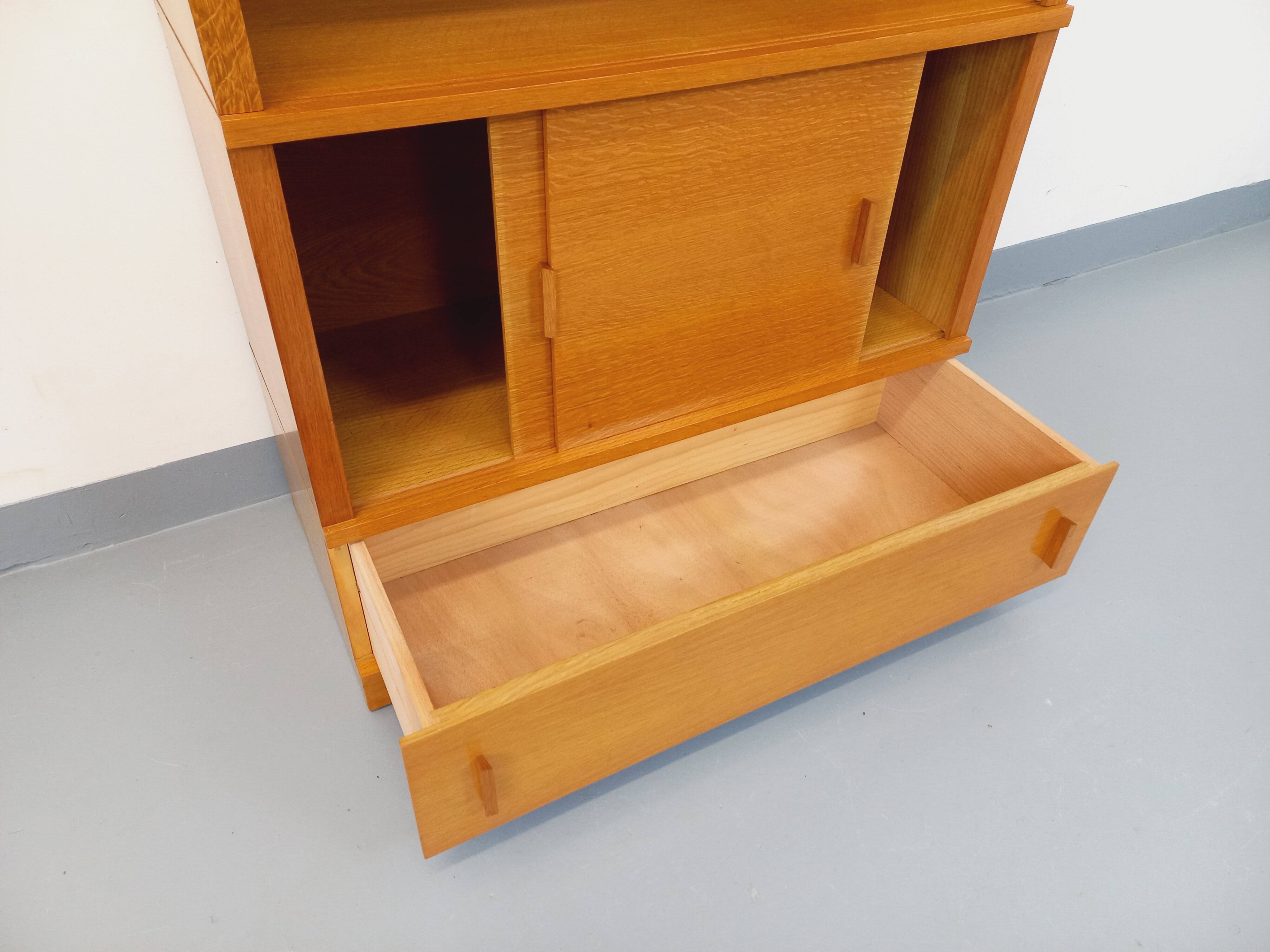 Vintage oak storage bookshelf from the 1960s.