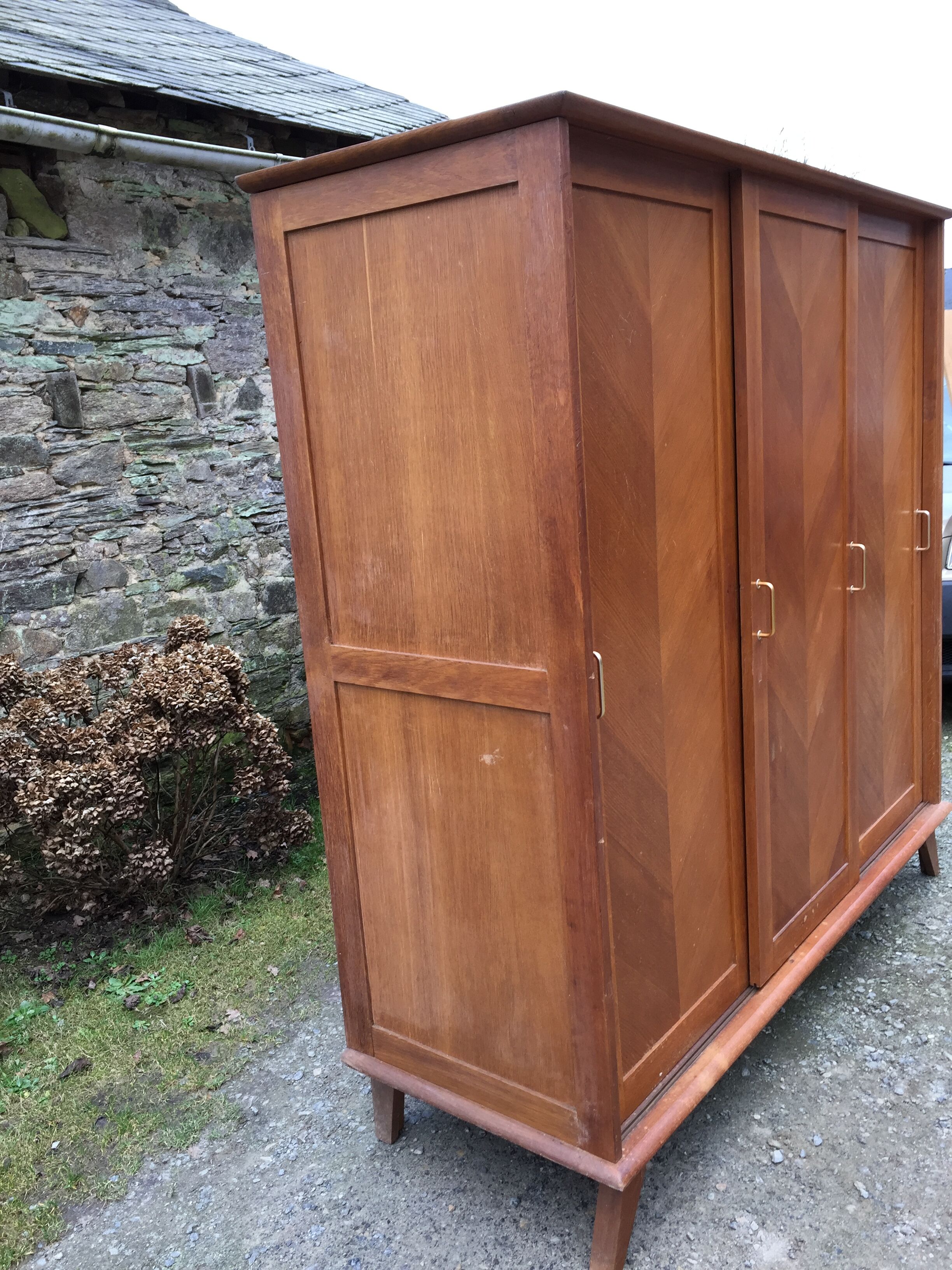 Vintage wardrobe compass feet with 3 sliding oak doors.