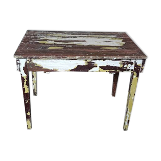Farmhouse table in patinated fir wood white yellow and brown