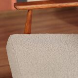 Armchair and ottoman in boucle fabric by H. Lis