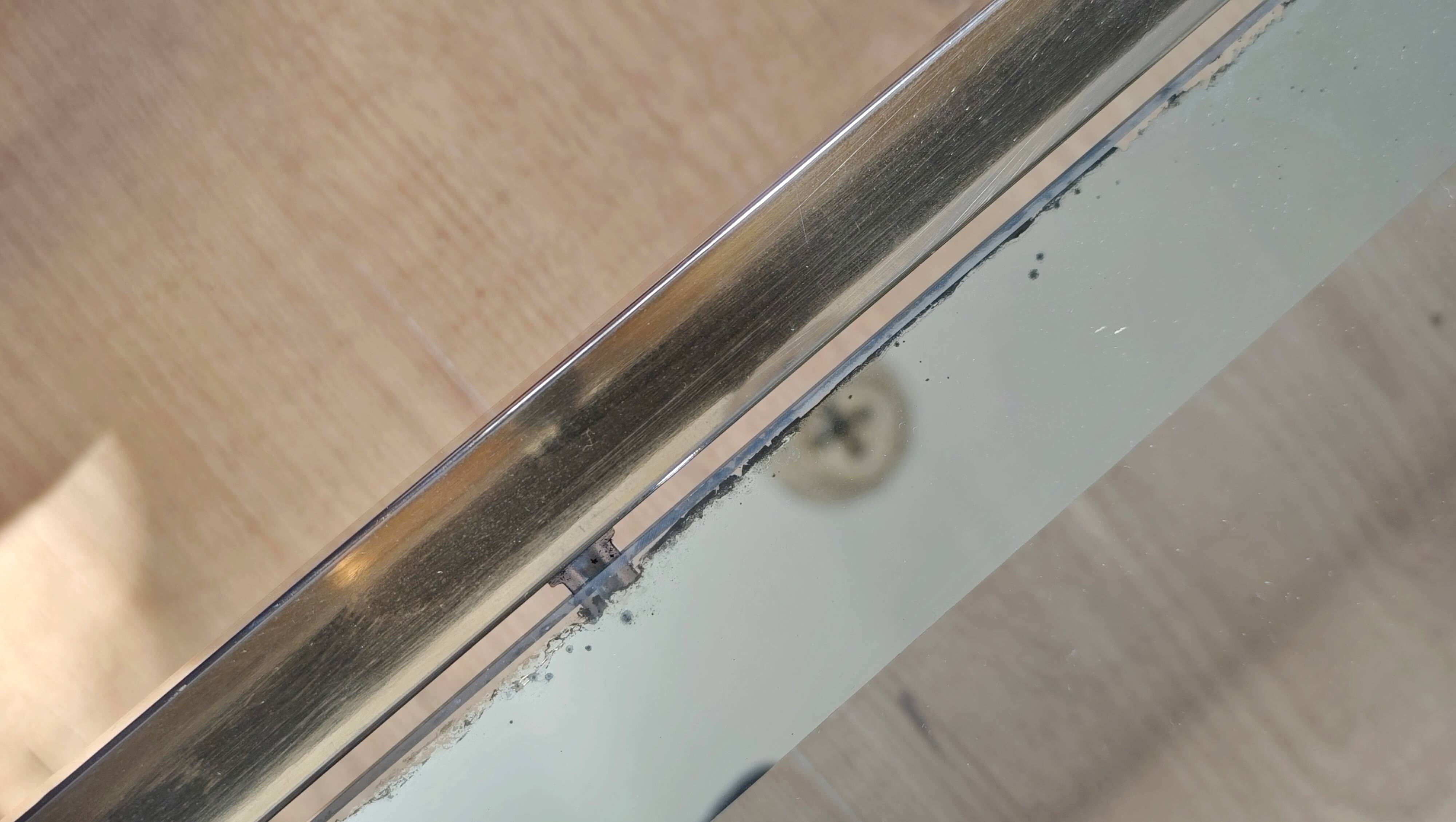 Vintage coffee table with glass, mirror, and brass.