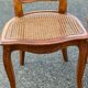 5 solid wood caned chairs, Louis XV style, stamped Baumann