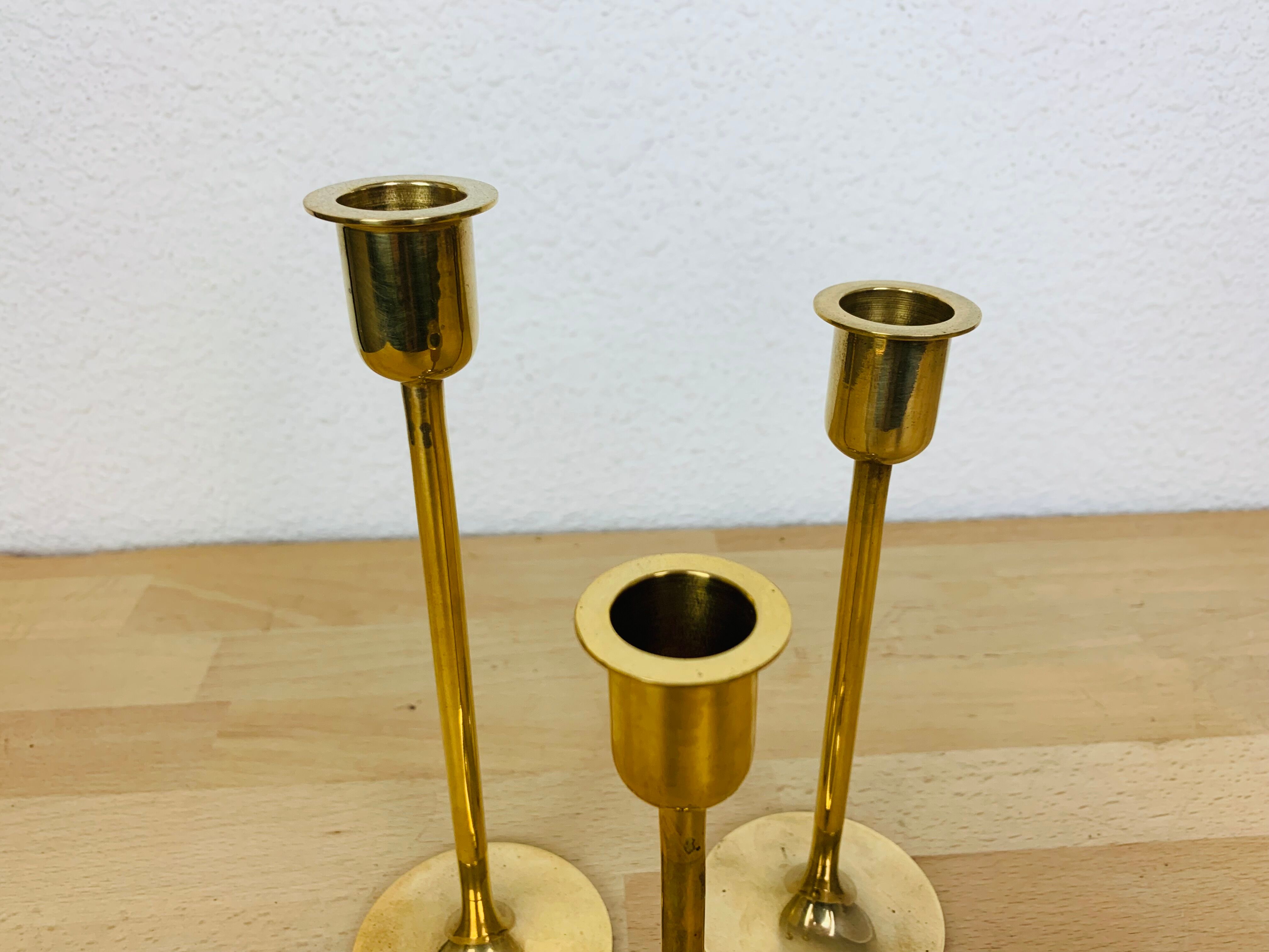 Three Scandinavian brass candle holders