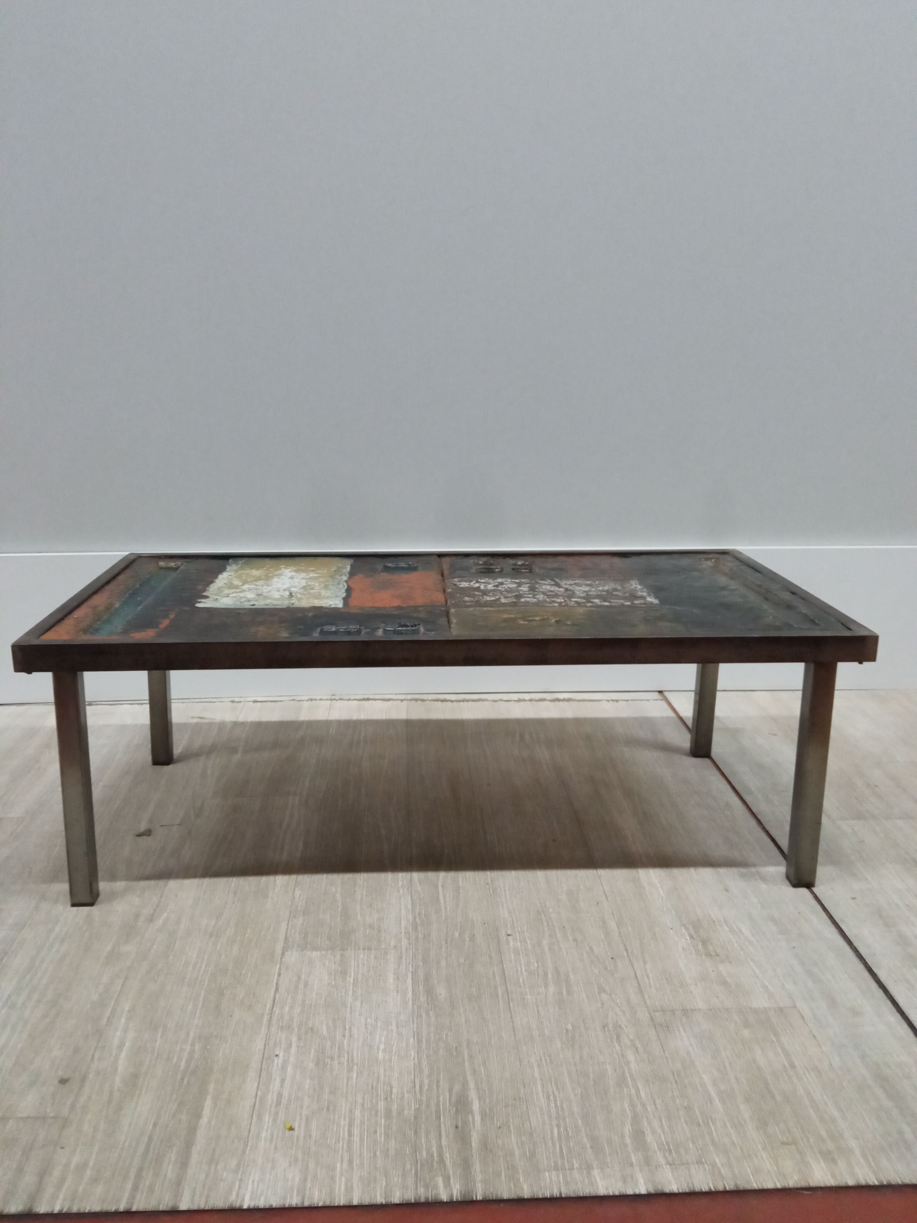Coffee table in enamelled lava stone
