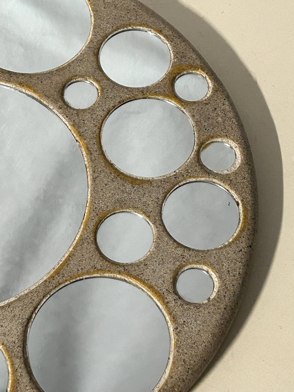 Round ceramic mirror