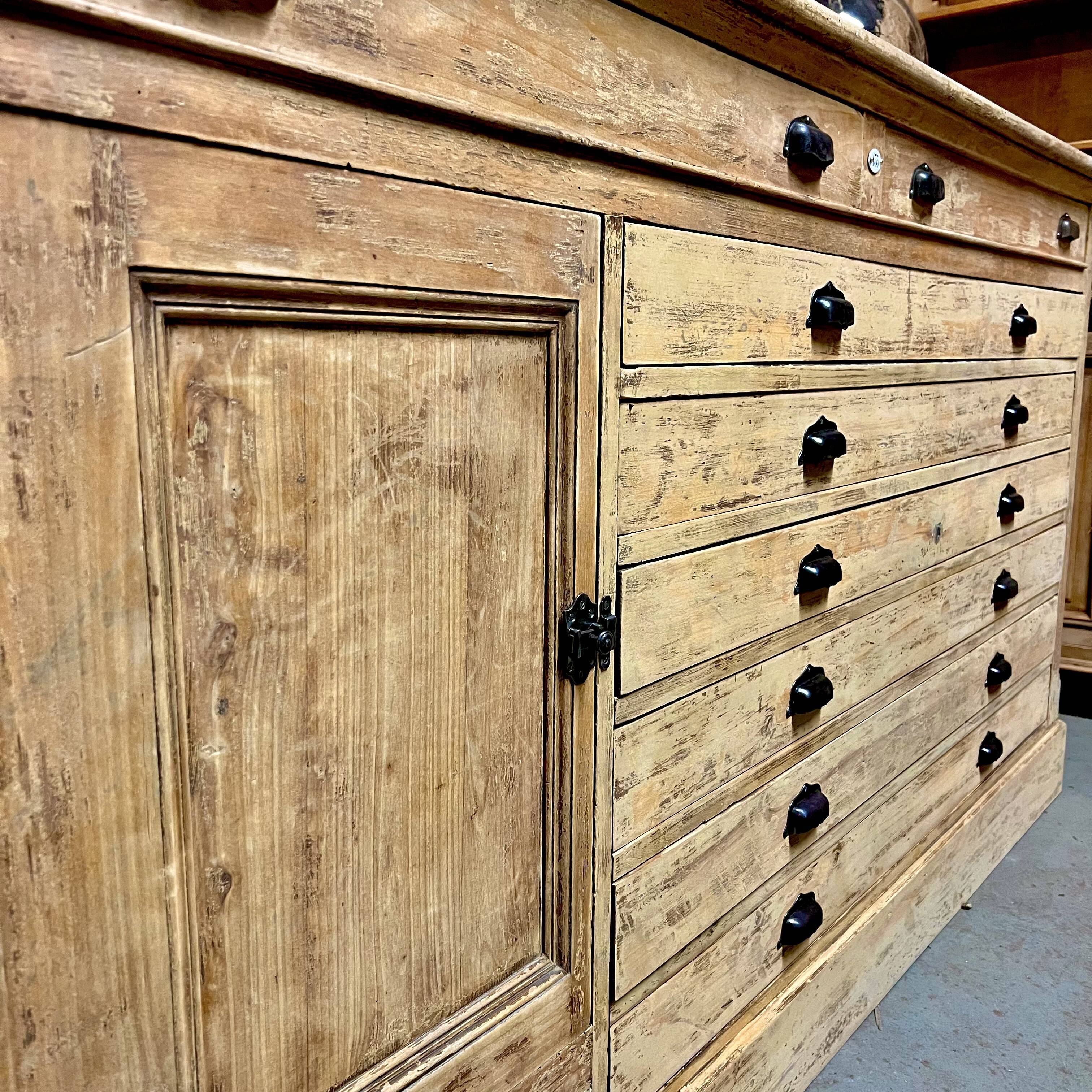 Old piece of furniture by trade with an architect's plan