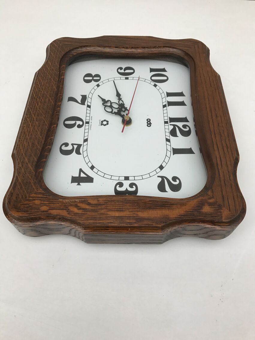 Odo in wood and vintage glass quartz pendulum clock