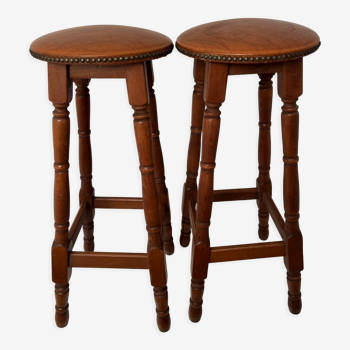 Pair antique bar stools above skaï