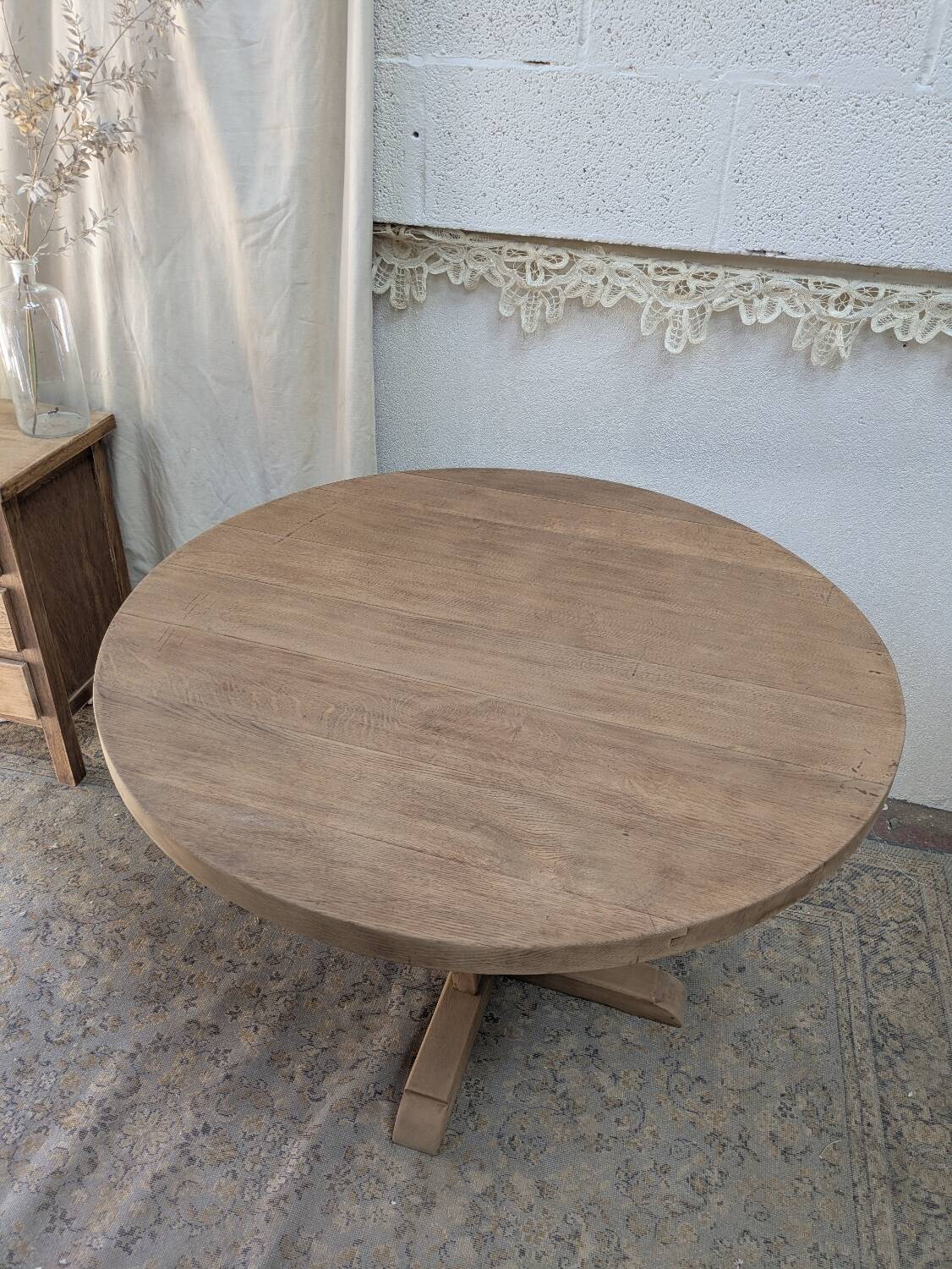 Round table in raw oak