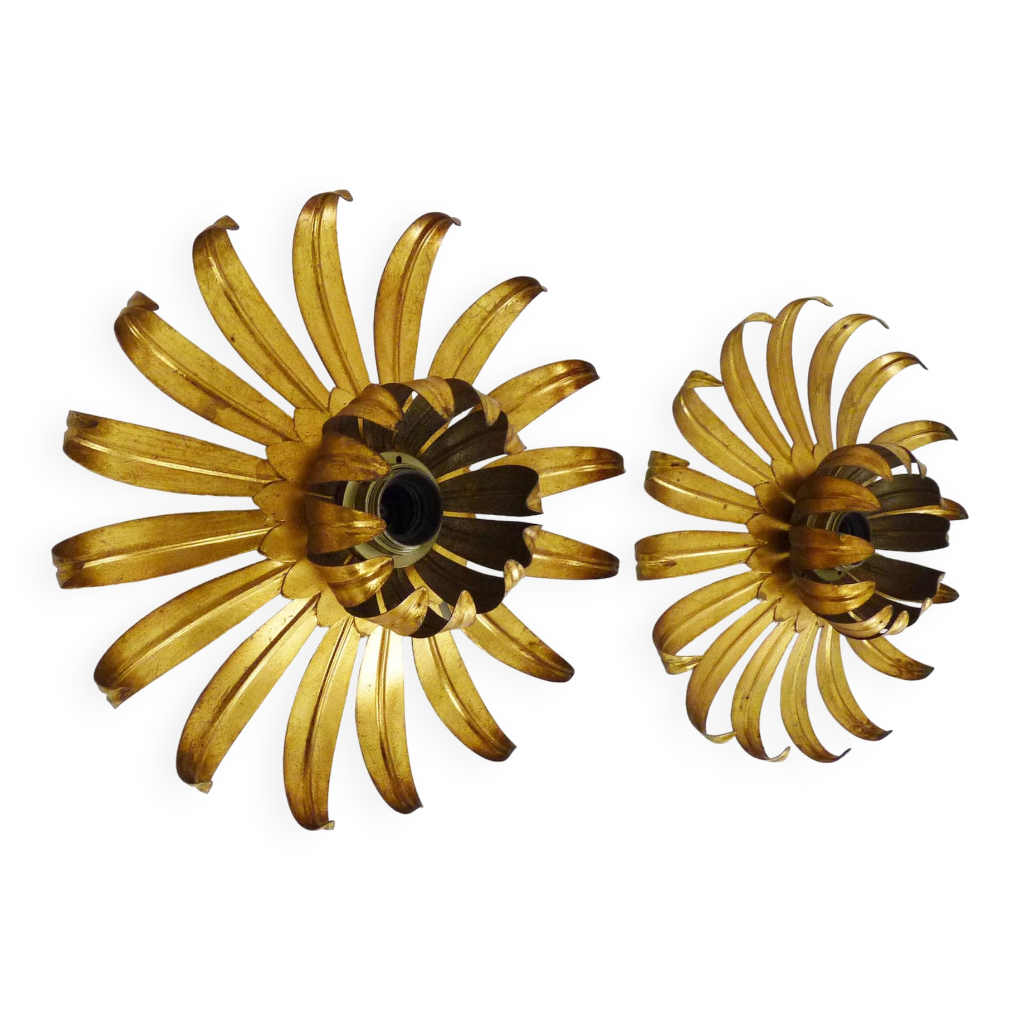 Pair of palm tree wall lights in gold metal. 70s