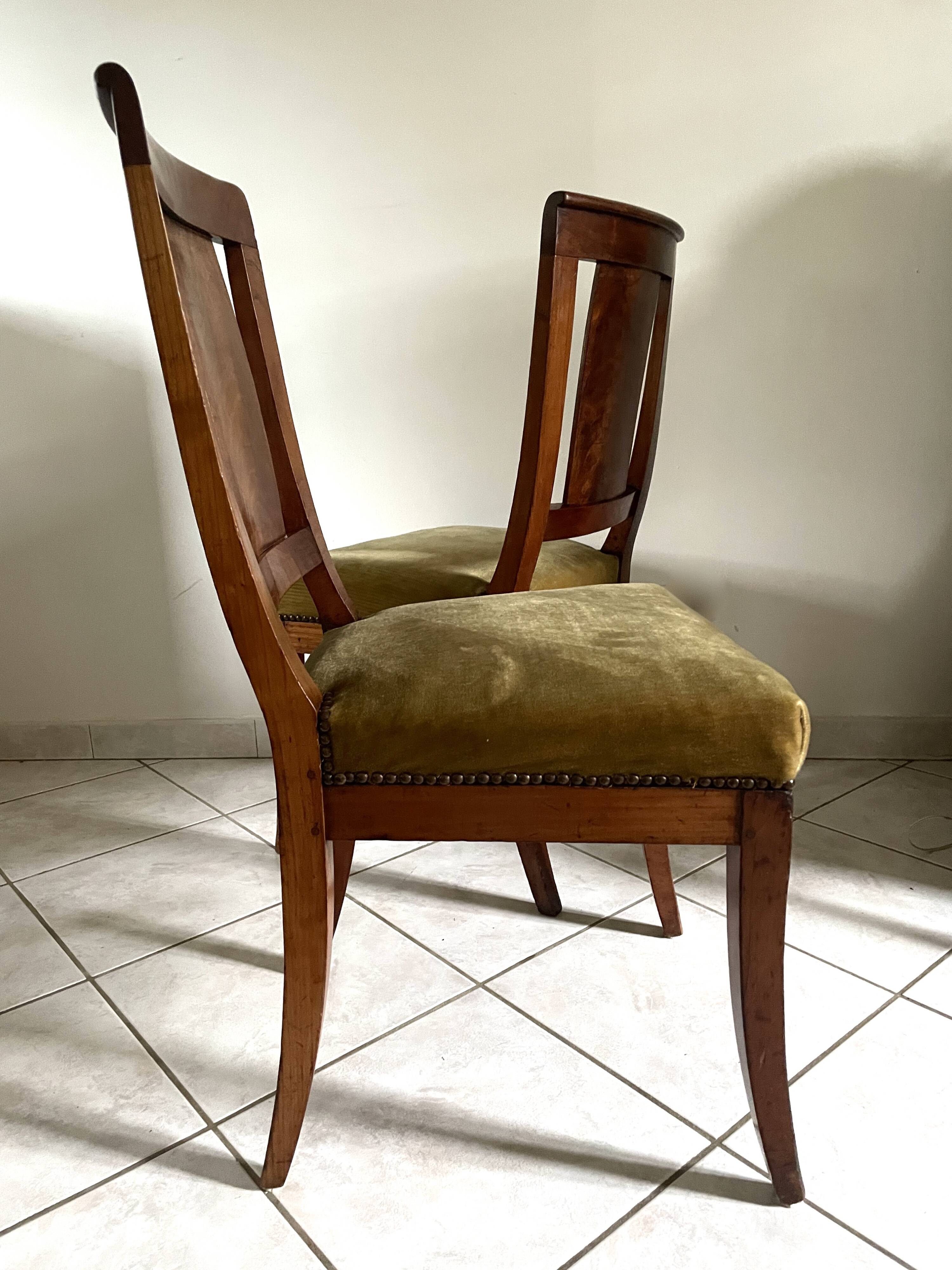 Pair of wooden chairs in green corduroy velvet in Directoire style.