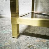 Golden side table and smoked glass