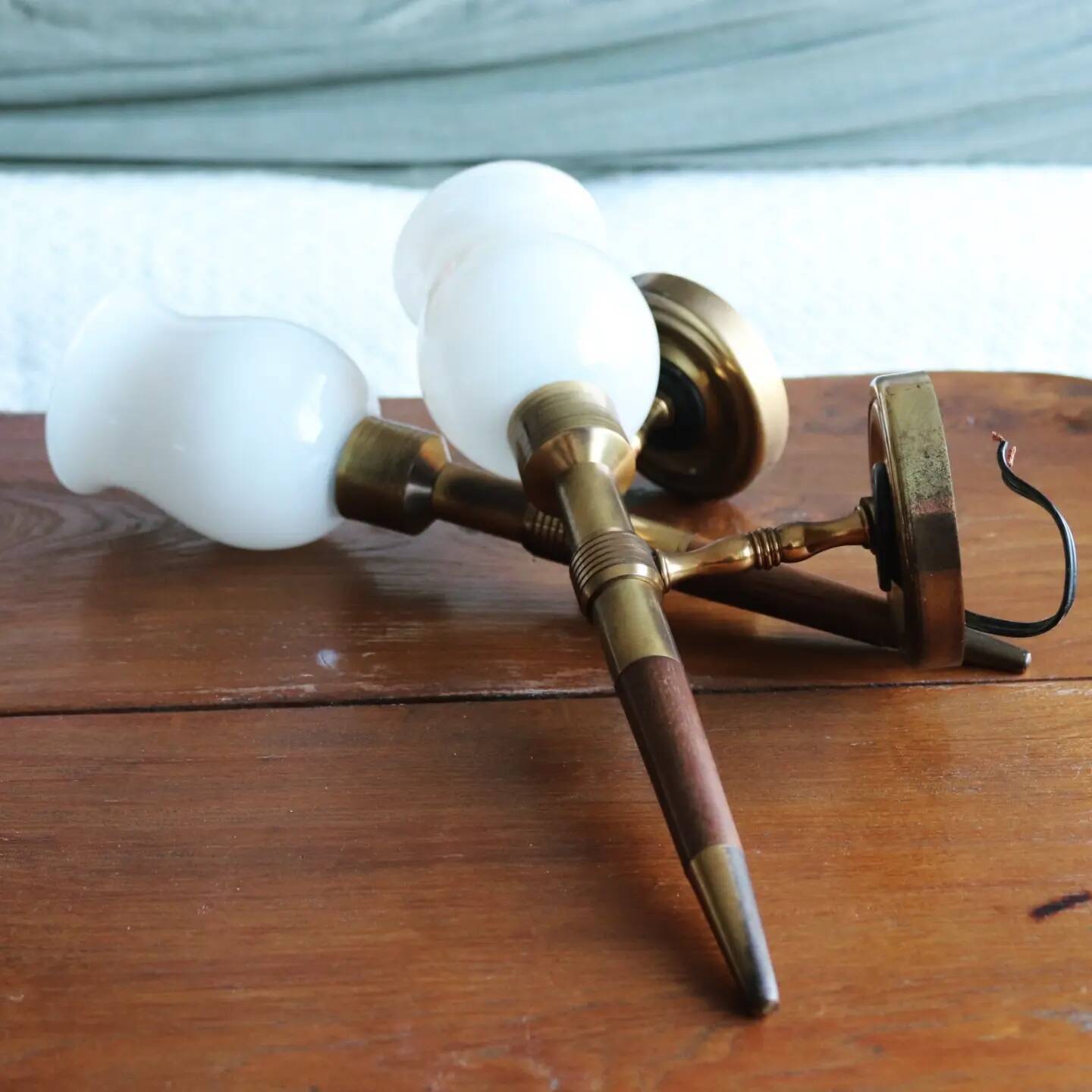 Pair of vintage Lunel house wood and brass wall lights