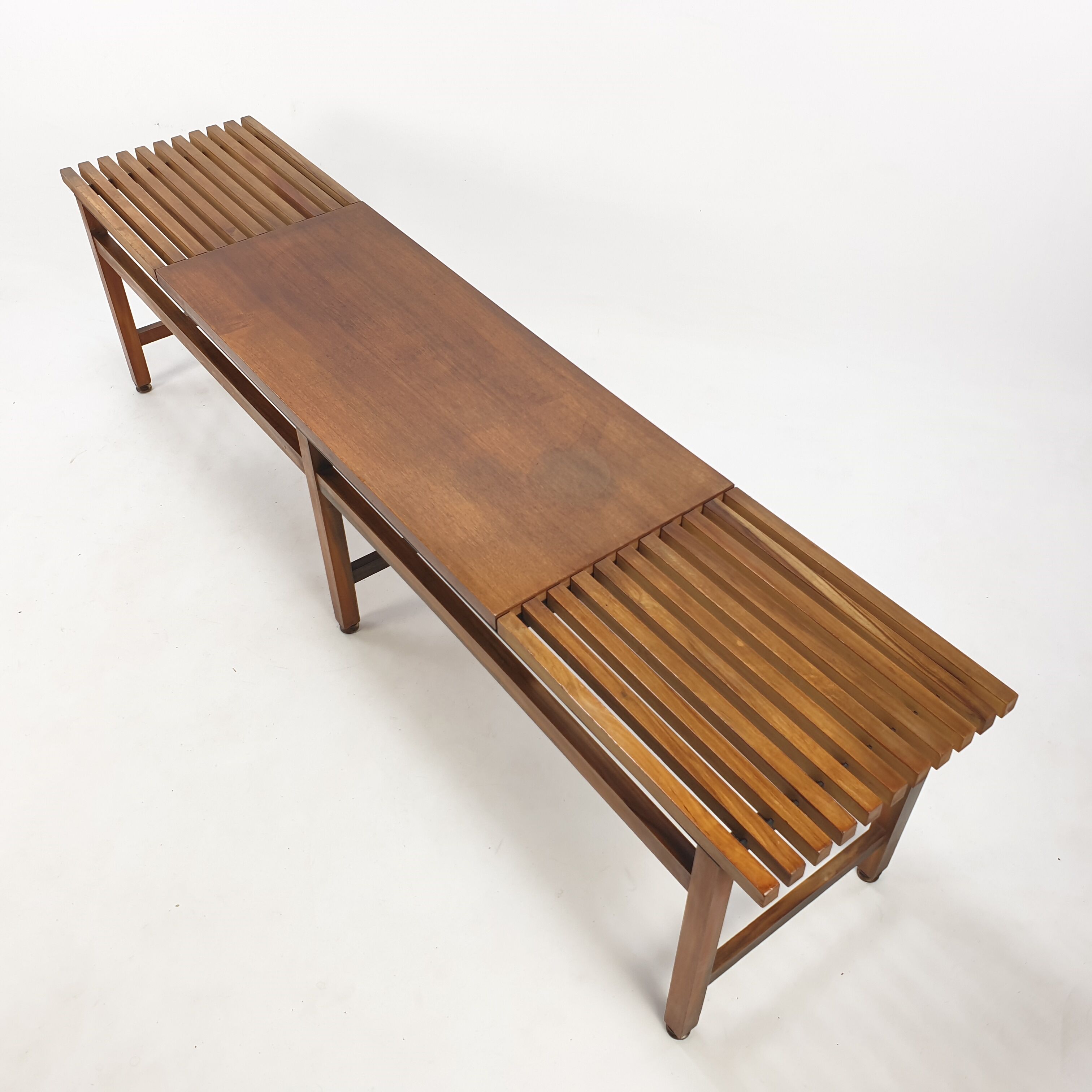 Bench in walnut and teak with brass feet, italy 1950s