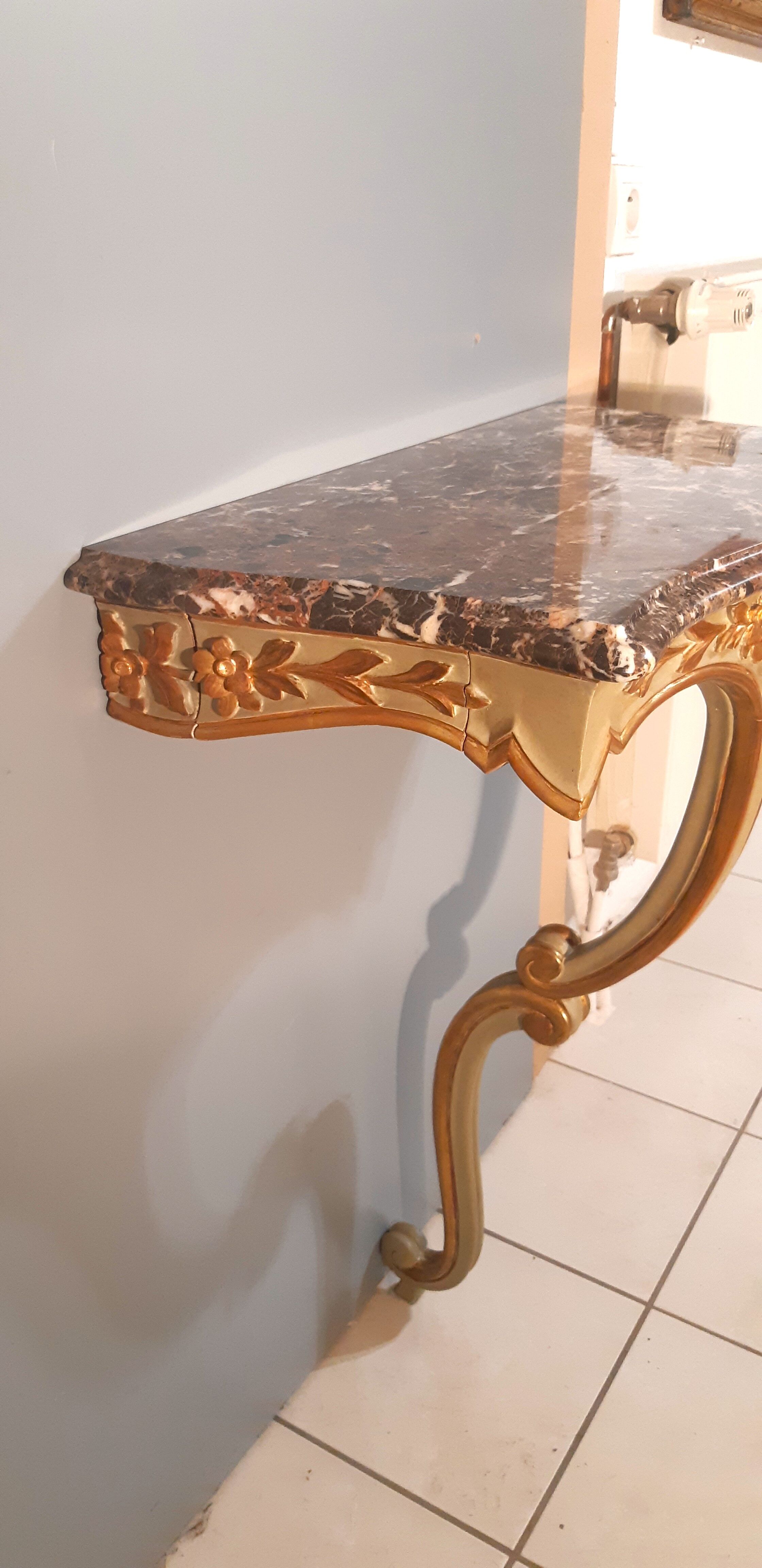 Louis XV style wall lamp console, twentieth century, wood and gilded stucco marble top