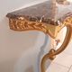 Louis XV style wall lamp console, twentieth century, wood and gilded stucco marble top