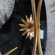 Vintage 1950s wall lights, black metal with gilded brass, 50s retro.