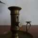 Pair of vintage brass pusher candle holders