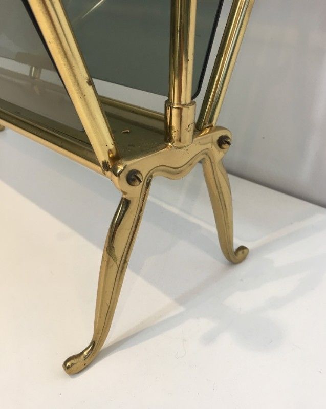 Neoclassical magazine rack in brass and blue glass