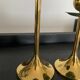 Trio of vintage brass candlesticks