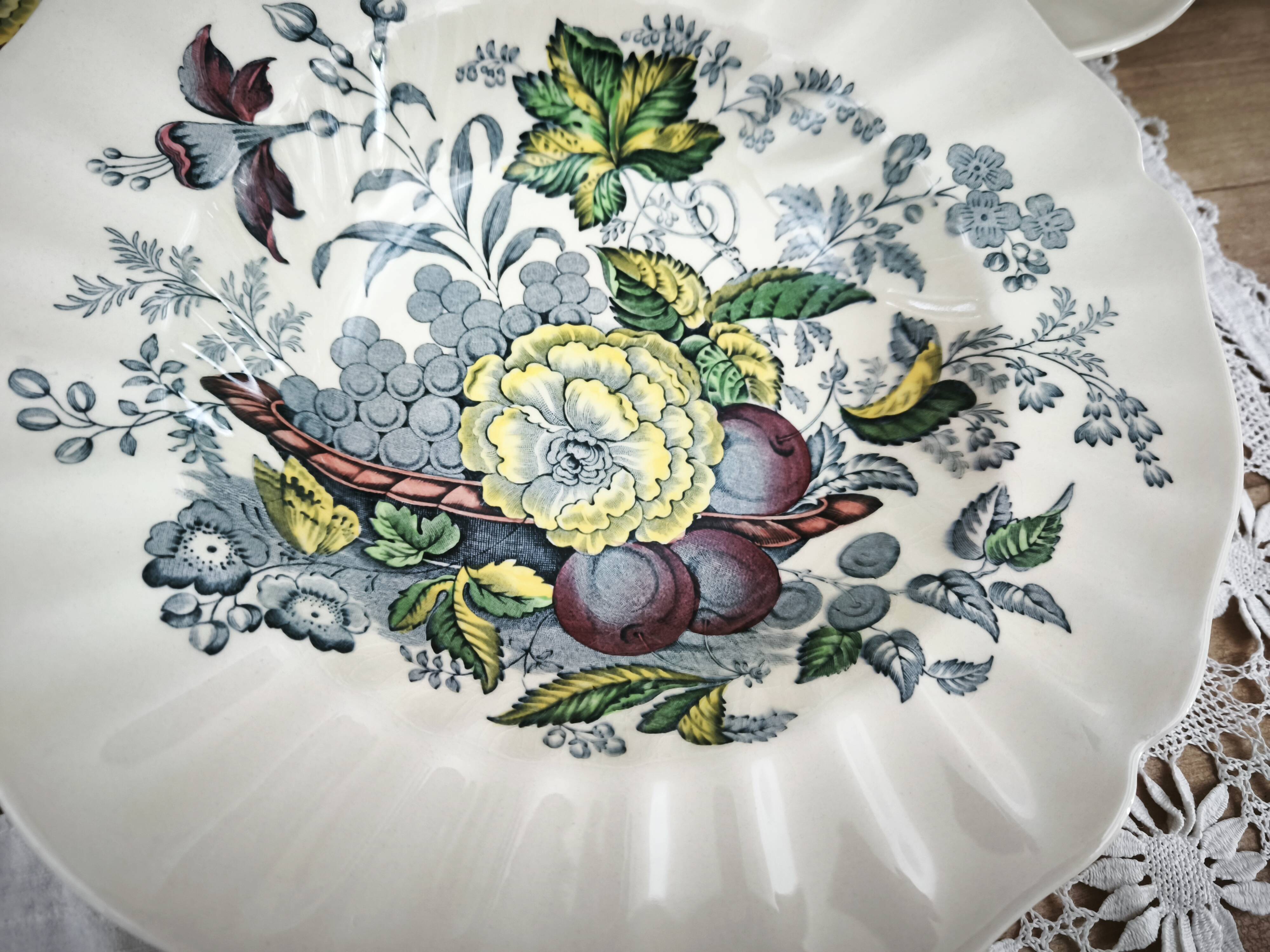 Set of 5 Royal Doulton deep plates in the Kirkwood pattern.