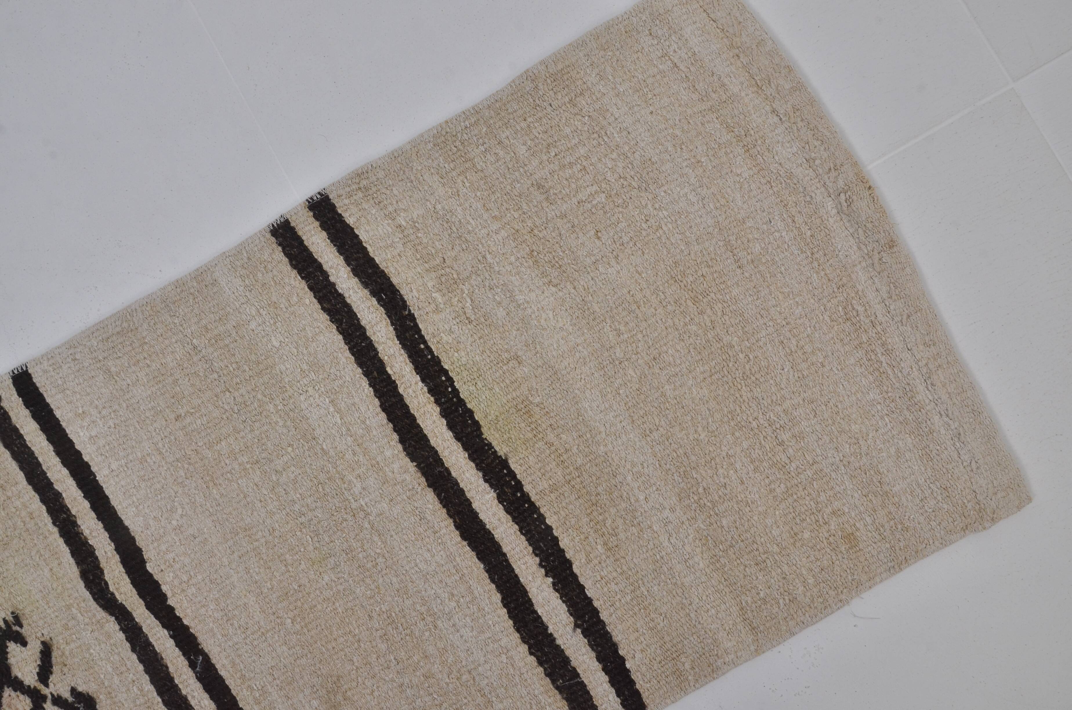 Tapis vintage en chanvre fait main