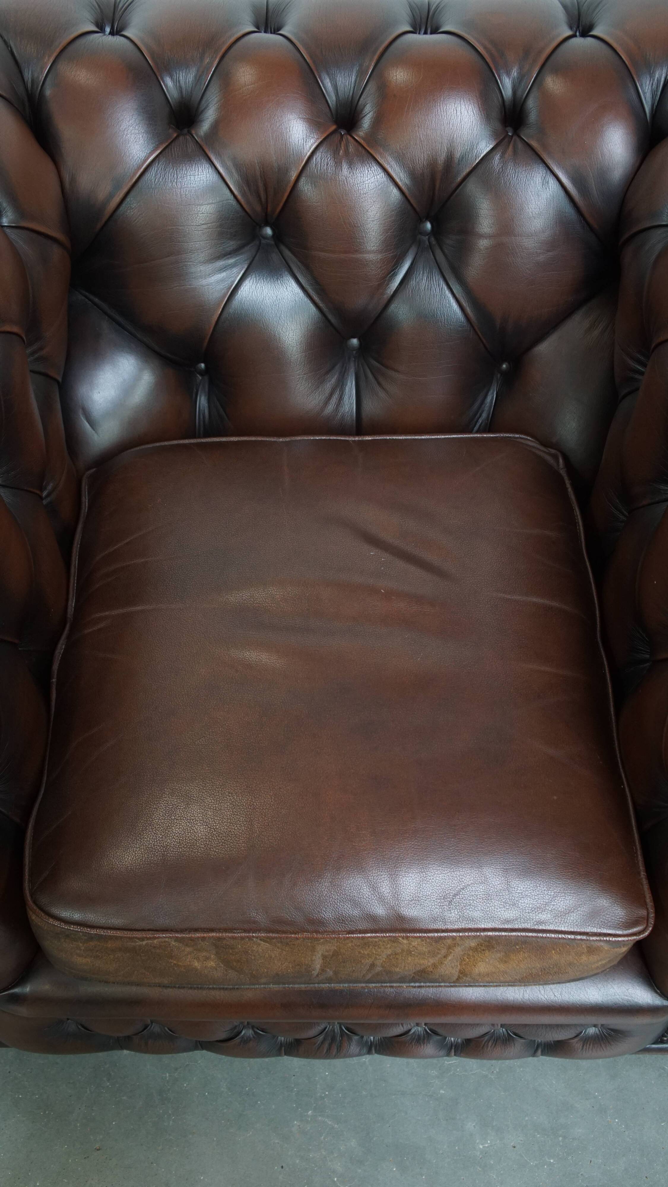 Dark brown English cowhide leather chesterfield armchair