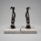 Art Deco bookends with patinated ibex in a taupe marble base.