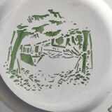 Round dish of Creil and Montereau green color with stamp and hollow mark
