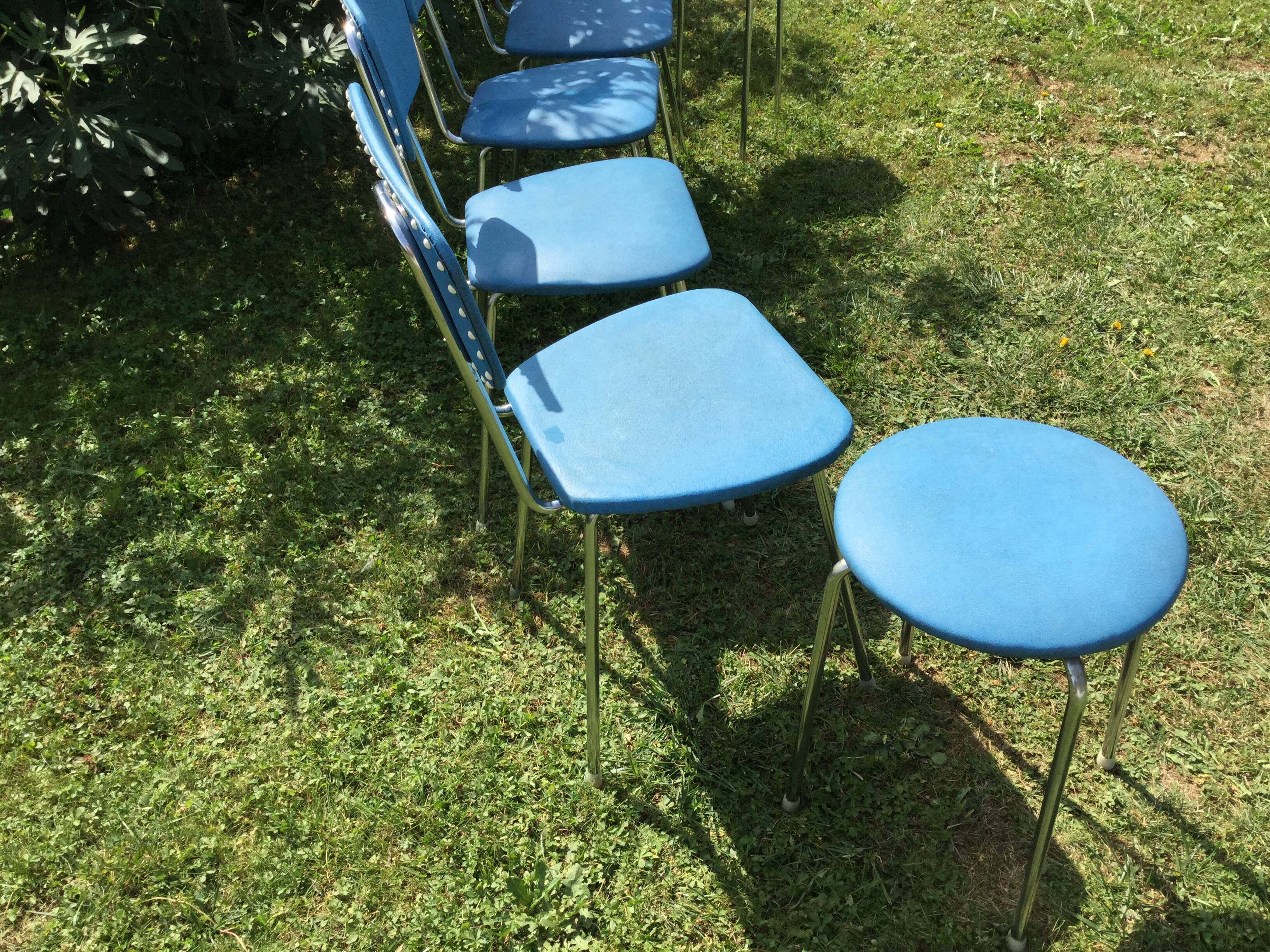 Lot of chairs and blue rockabilly stools