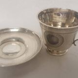 cups and saucers in solid silver