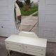 Mid-Century silver dressing table in glass and paint, central oval mirror, 1950s.