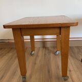 Vintage coffee table on casters