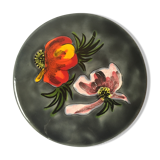 Underside of flat ceramic pink flowers La Roue de Vallauris