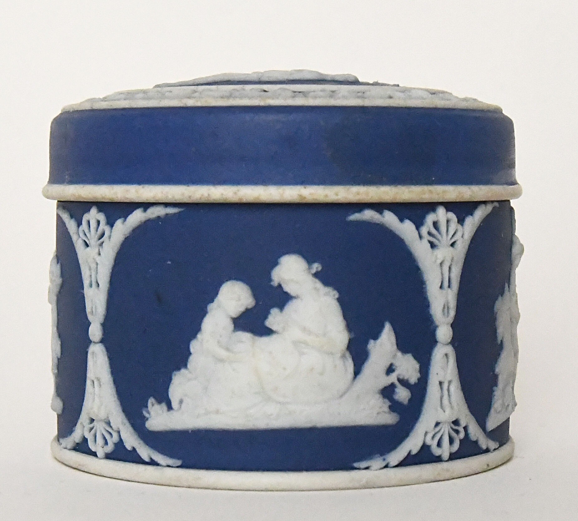 Pair of Wedgwood biscuit boxes with relief decoration of antique scenes